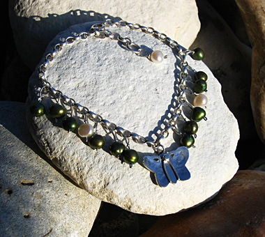 Sterling silver butterfly bracelet with green and white freshwater pearls