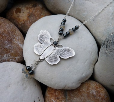 Sterling silver butterfly necklace with haemetite and Swarovski crystal grey opals